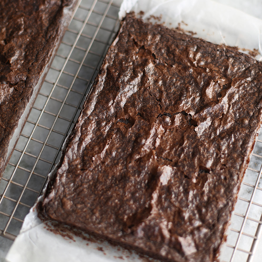 Chocolate brownies are a classic American dessert. We frequently debate their finer points – fudgy, chewy, or cakey?